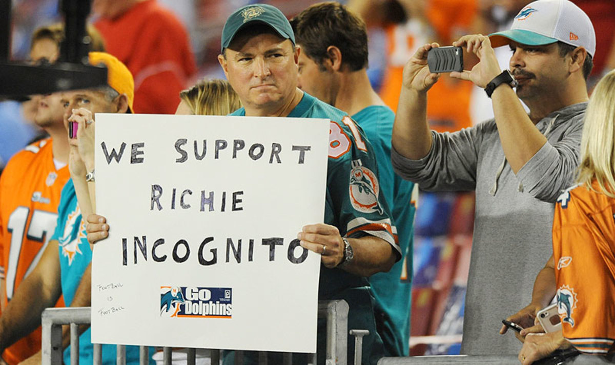 Some Miami Dolphins fans shared their viewpoint during the team's nationally televised loss to the Tampa Bay Buccaneers on Monday night. (Jim Rassel/Getty Images)