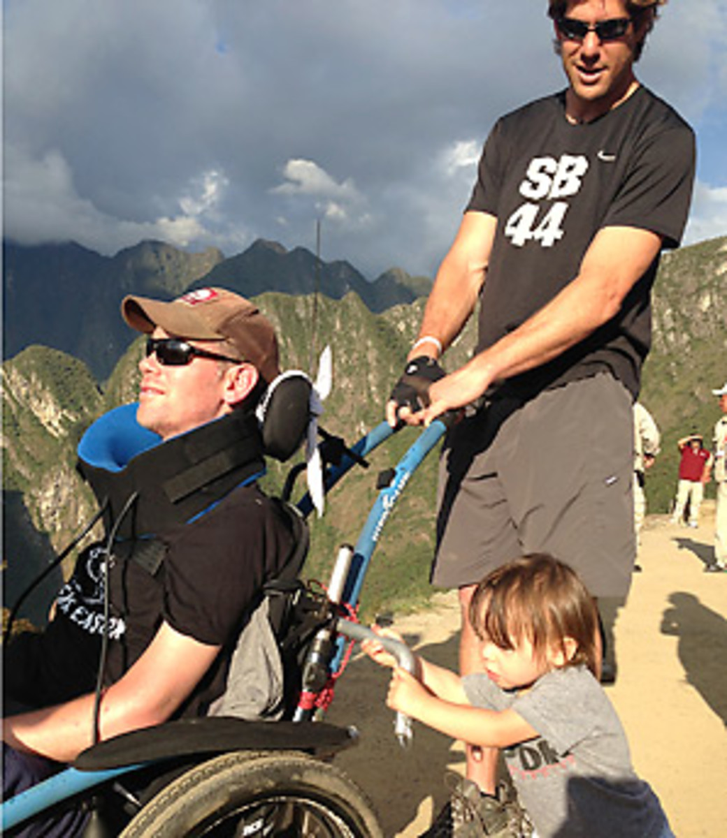 Steve Gleason, son Rivers and former Saints teammate Scott Fujita traveling in Machu Picchu.