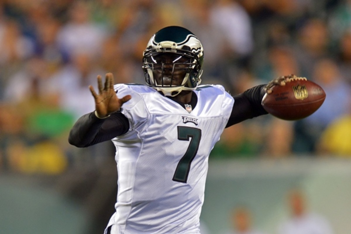 Chip Kelly believes the QB uncertainty will benefit Vick "tremendously" (Drew Hallowell/Getty Images)