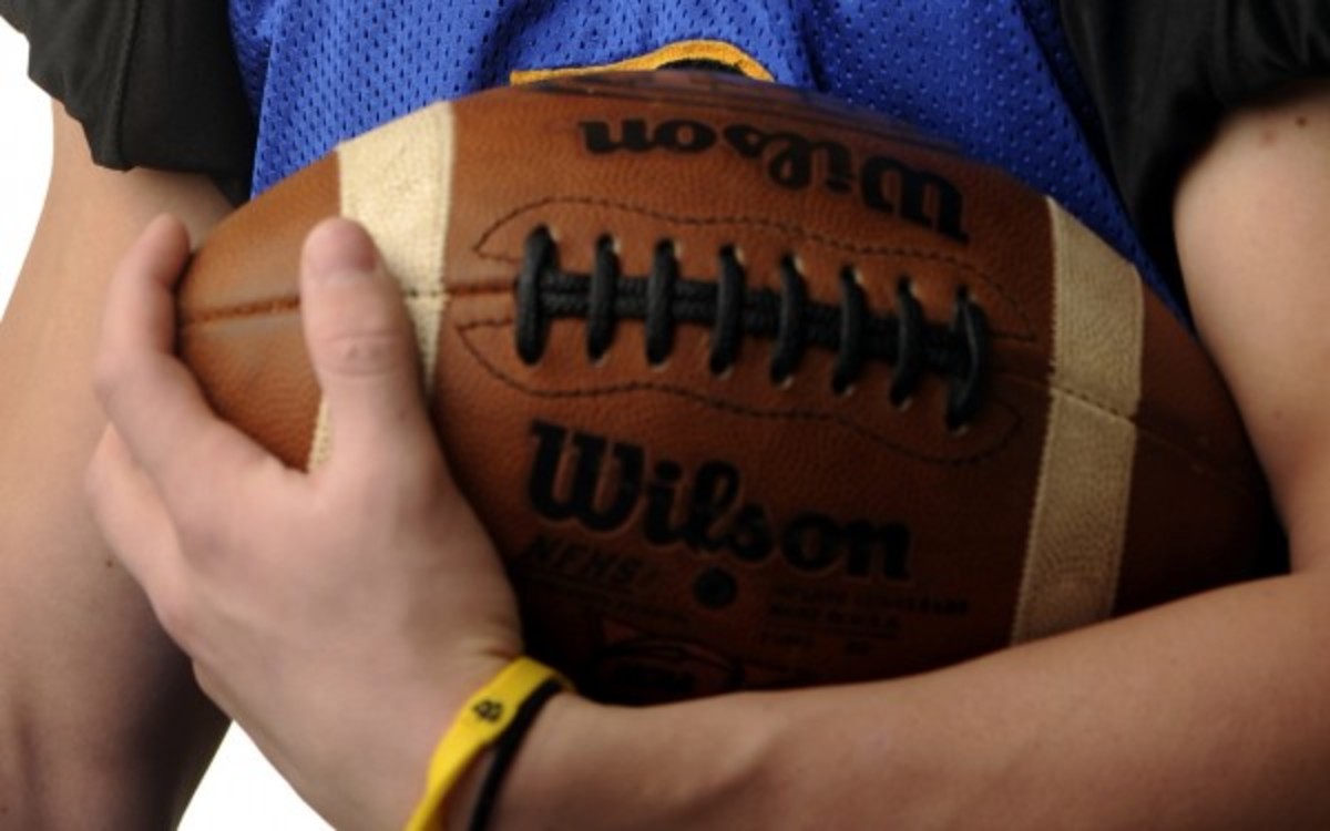 A high school football coach suspended his entire team. (Denver Post via Getty Images)