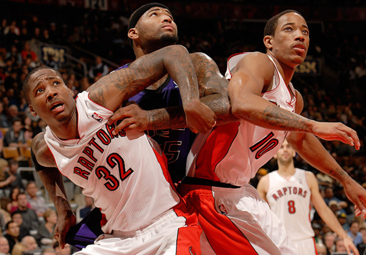 Ed Davis boxes out DeMarcus Cousins