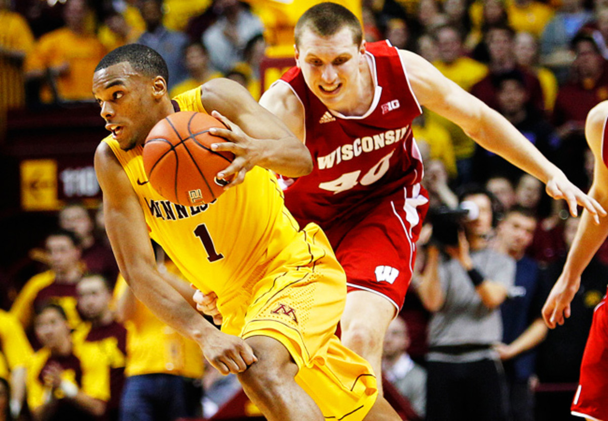 Andre Hollins and Minnesota knocked off Wisconsin in overtime on Thursday night.