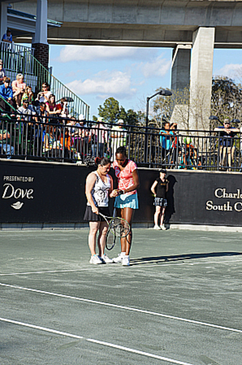 Venus showing me the proper way to toss a ball. (Photo by Ben Rothenberg)