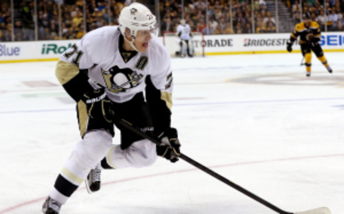 Evgeni Malkin signed an 8-year, $76 million extension with the Penguins on Thursday. (Bruce Bennett/Getty Images)