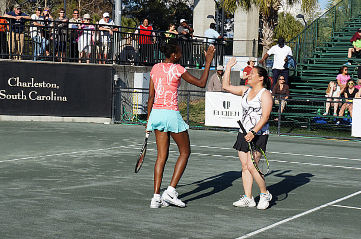 Hi-fiving our height differential. (Photo by Ben Rothenberg)