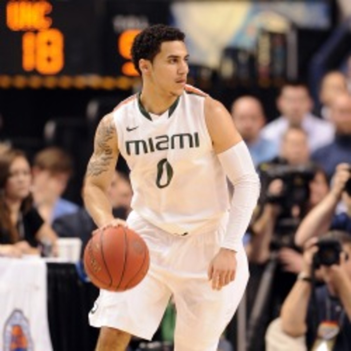 Miami guard Shane Larkin will reportedly enter the NBA Draft. (Lance King/Getty Images)