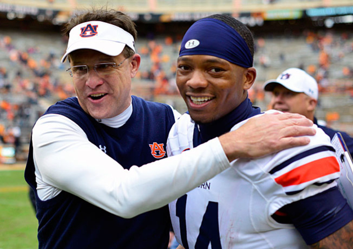 Behind first-year coach Gus Malzahn (left) and QB Nick Marshall, Auburn is in contention for a BCS berth.