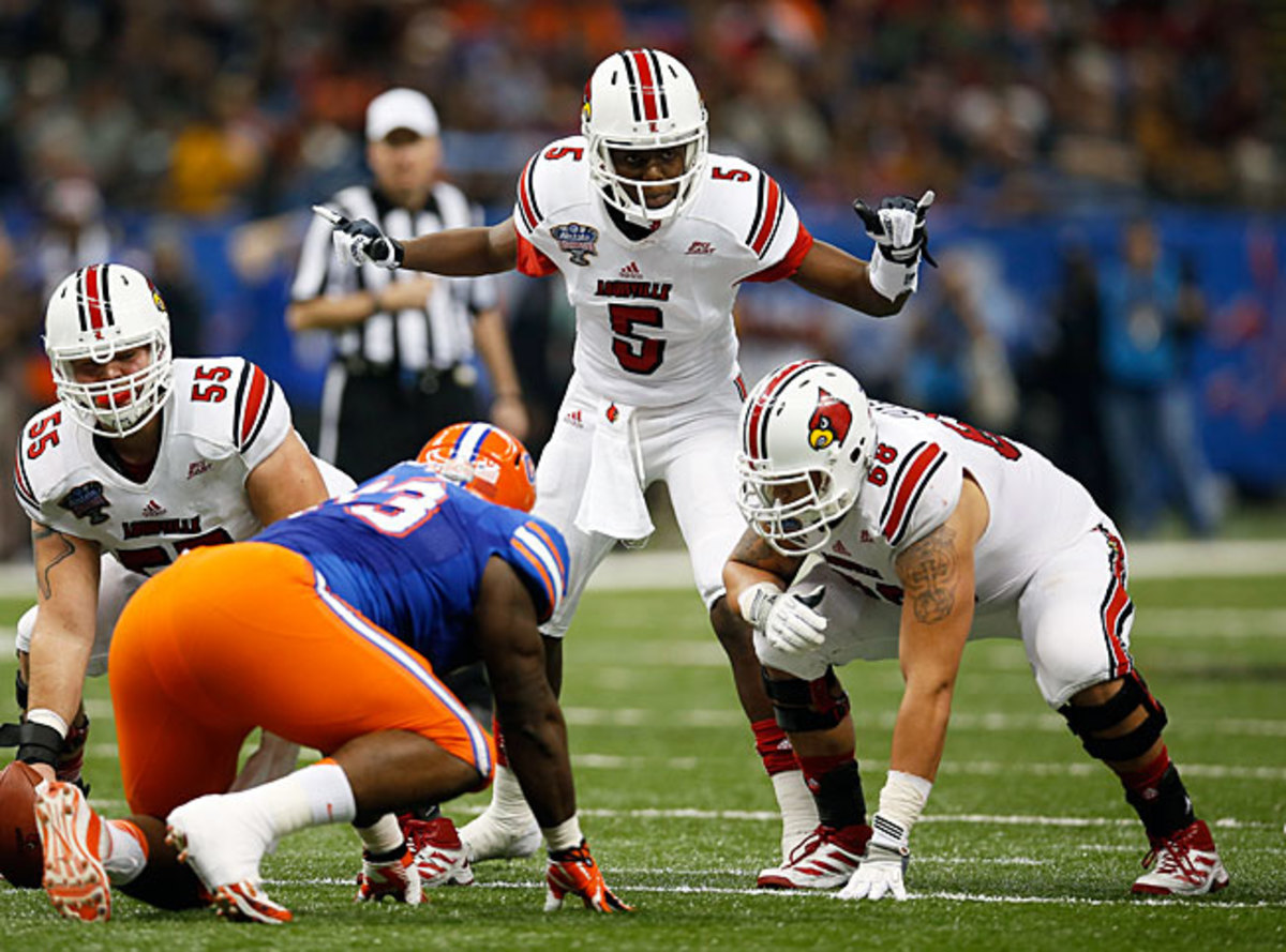 Louisville quarterback Teddy Bridgewater (5) went 20-of-32 for 266 yards and two TDs against Florida.