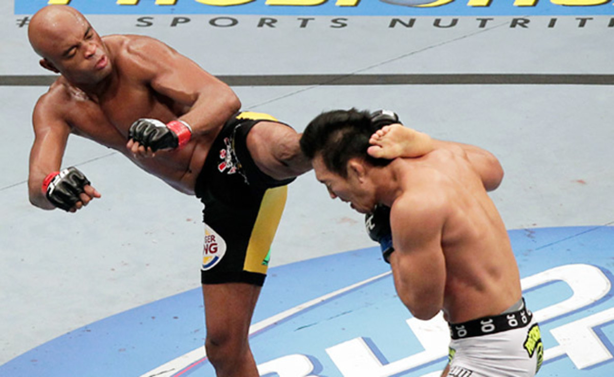 Anderson Silva (left) will await Michael Bisping if Bisping can get past Vitor Belfort on Jan. 19.
