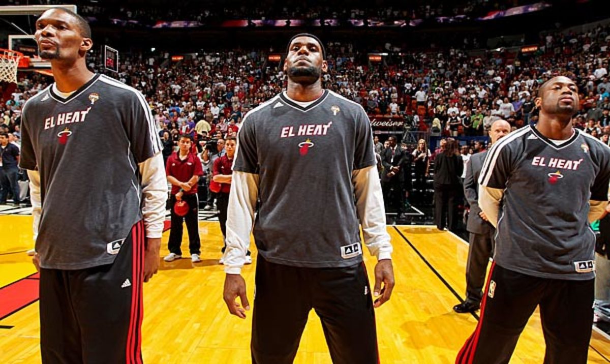 Miami's Big Three of (from left) Chris Bosh, LeBron James and Dwyane Wade has combined to miss only two games during the winning streak. (Issac Baldizon/NBAE via Getty Images)