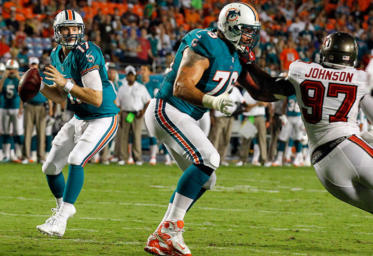 Ryan Tannehill and Lydon Murtha (Charles Trainor Jr./Getty Images)