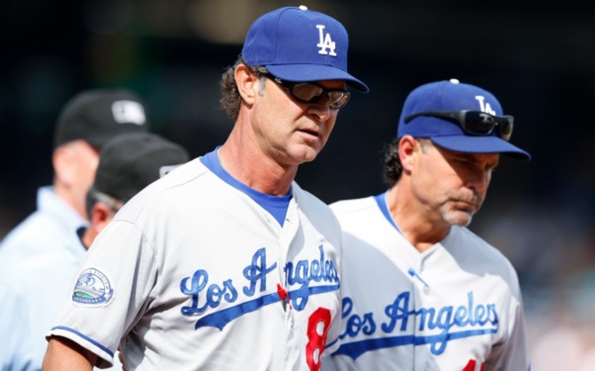 The Los Angeles Dodgers fired bench coach Trey Hillman (right) (Joe Robbins/Getty Images)