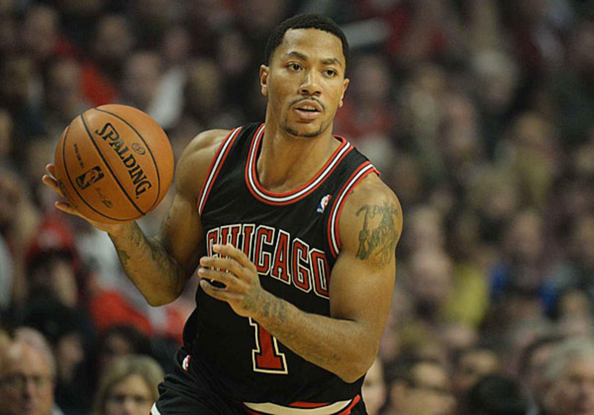 Derrick Rose was helped from the Bulls loss to the Blazers with an injury to his right knee. (David E. Klutho/Sports Illustrated)