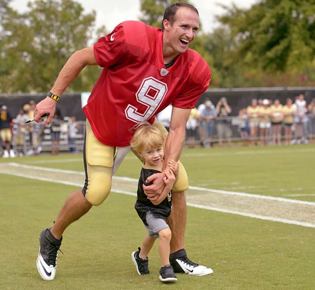 Athletes and their Kids at NFL Camps Sports Illustrated