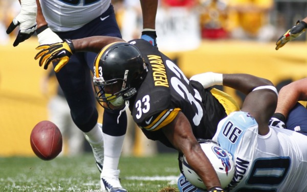 Isaac Redman fumbled twice Sunday but will remain Pittsburgh's starting running back. (Justin K. Aller/Getty Images)