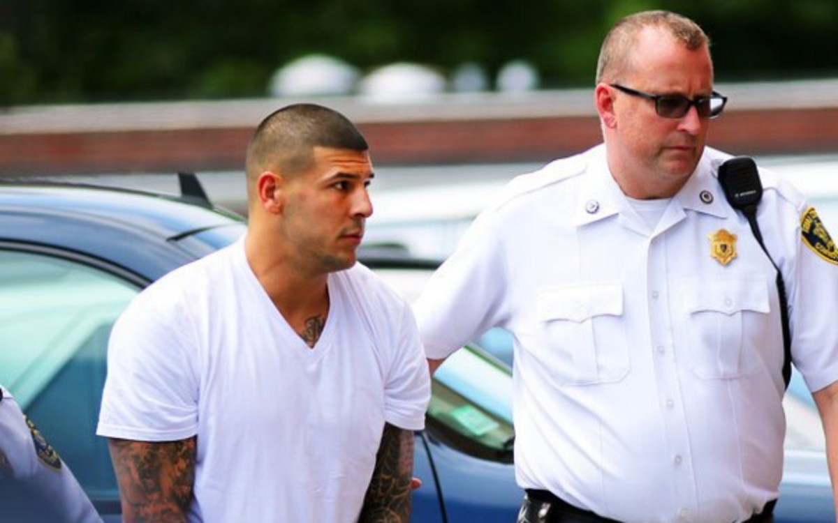 Aaron Hernandez is currently awaiting trial for the murder of Odin Lloyd.  (Getty Images)