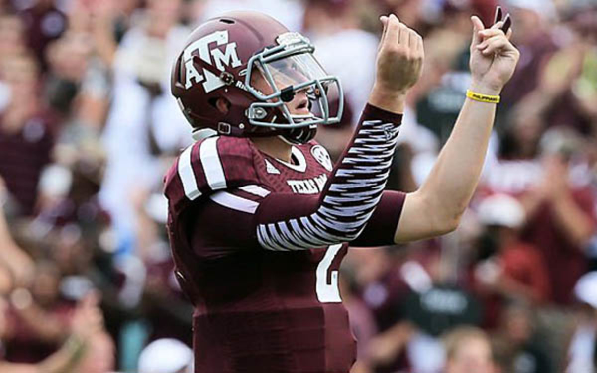 Texas A&M quarterback Johnny Manziel probably won't be speaking to the media anytime soon. (Scott Halleran/Getty Images)