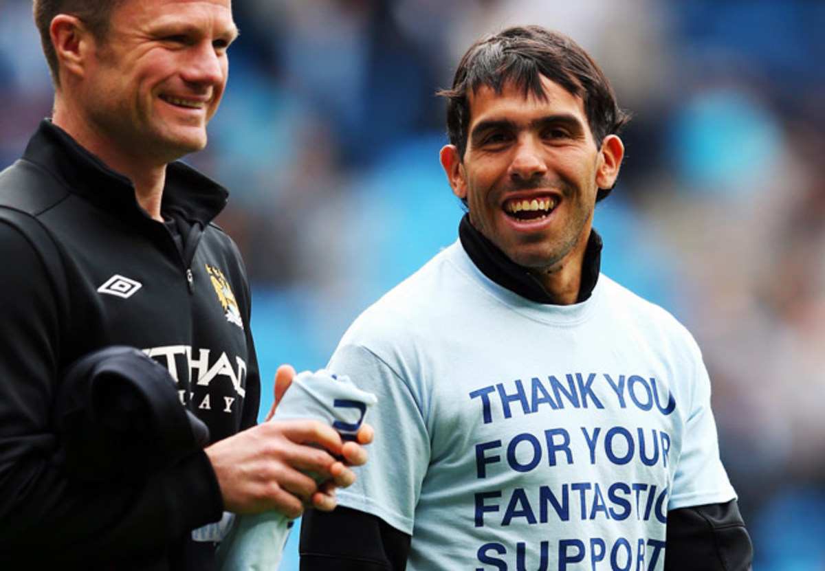Carlos Tevez (right) spent the last four seasons at Manchester City.