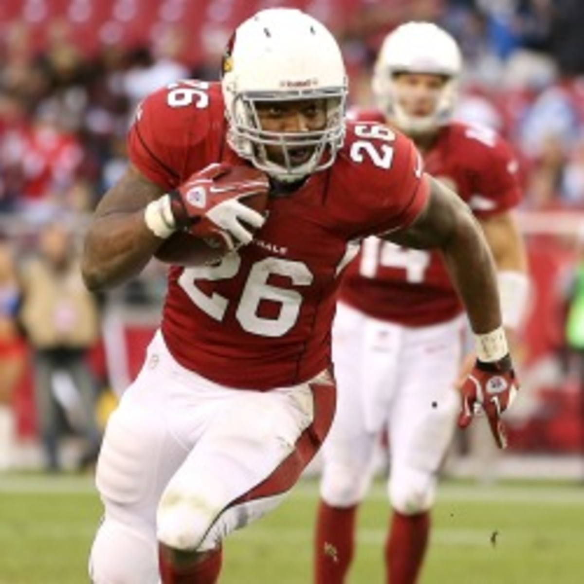 The Cardinals cut oft-injured back Beanie Wells, saving $1.5 million in cap space. (Christian Petersen/Getty Images)