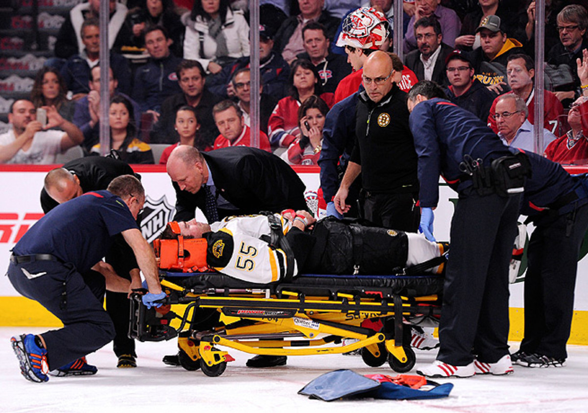 Johnny Boychuk was stretchered off the ice but was later released from an area hospital.