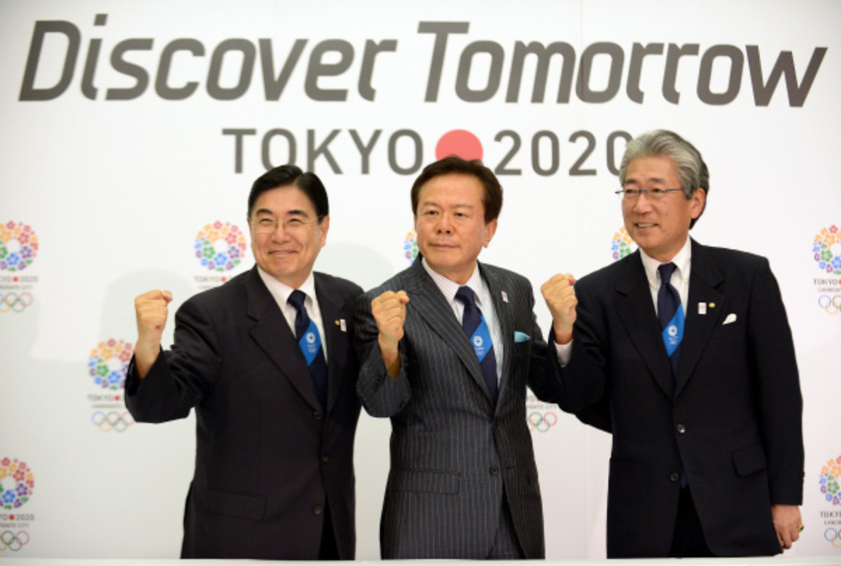 Tokyo Governor Naoki Inose (C), Japanese Olympic Committee President Tsunekazu Takeda (R) and Tokyo 2020 Bid Committee CEO Masato Mizuno pose at the 'Tokyo 2020 press conference.' The city received the highest praises in a recent IOC report evaluating  bids for the 2020 Summer Olympics (Toshifumi Kitamura/AFP/Getty Images)