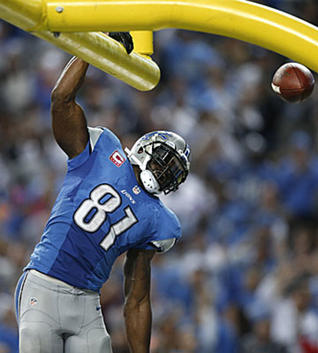 Calvin Johnson's 329-yard performance against Dallas in Week 8 was the second-best single-game showing of all-time, just seven yards from the record. (Rick Osentoski/AP)