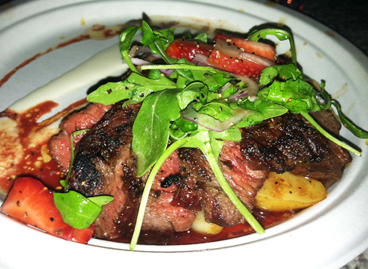 Steak with strawberries and duck fat at Bacchanal. (Andy Staples)