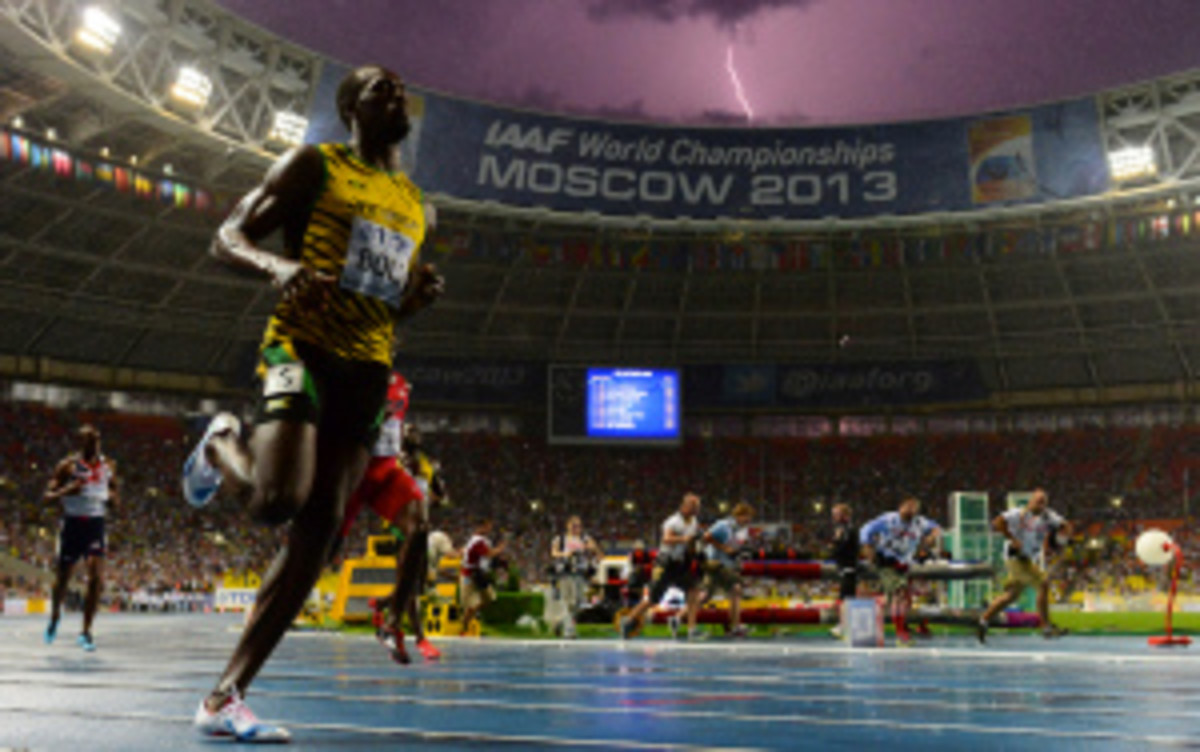 Usain Bolt won three gold medals at this year's World Championships. (Olivier Morin/Getty Images)
