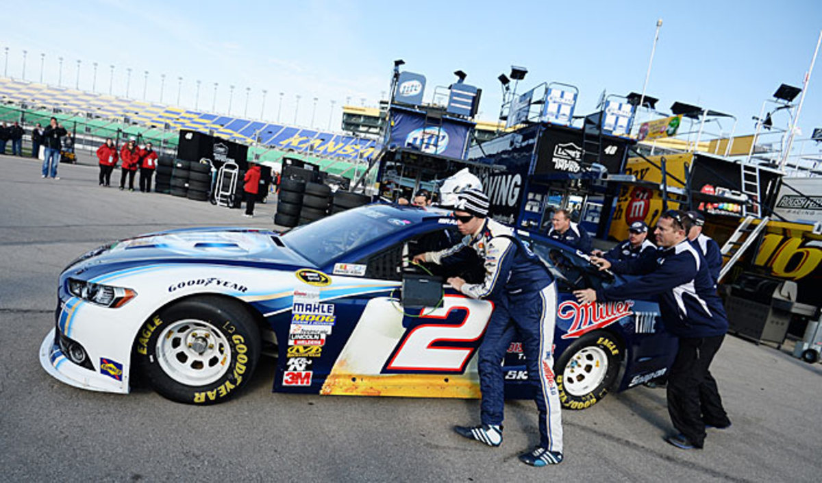 After being hit by sanctions, Brad Keselowski gutted out a sixth-place finish at Kansas on Sunday.