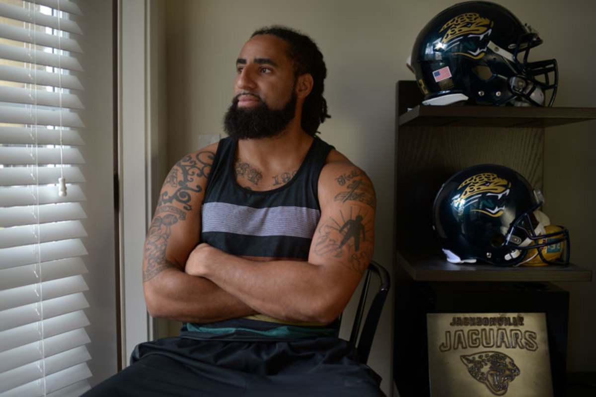 Already cut by two NFL teams in 2013, Lane knows his window of opportunity is closing. A surprise tryout is giving the young defensive end renewed hope. (Bill Frakes/SI)