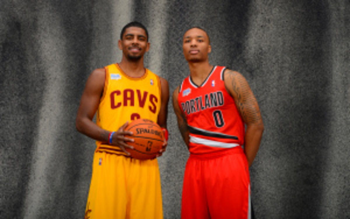 Kyrie Irving and Damian Lillard are two of 27 players invited to USA Basketball tryouts in Las Vegas this summer. (Jesse D. Garrabrant/Getty Images)