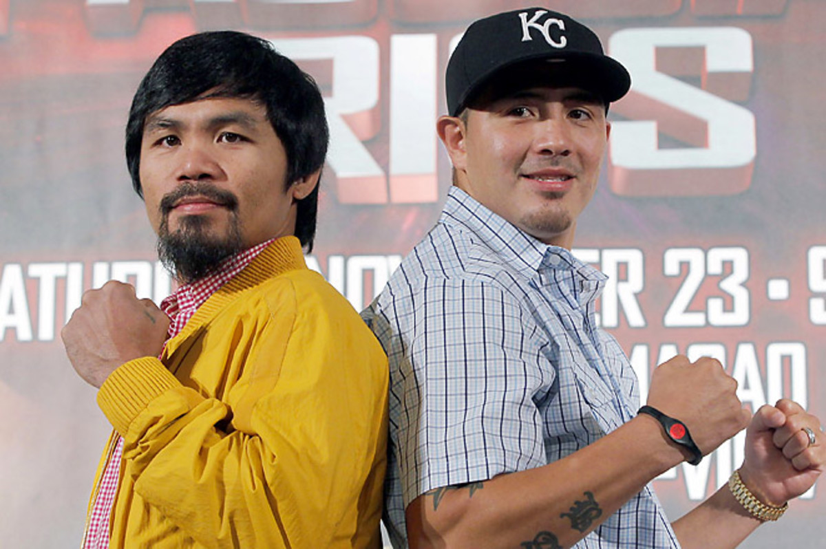 Pacquiao (L) is coming off losses to Timothy Bradley and Juan Manuel Marquez, followed by 11 months of inactivity.