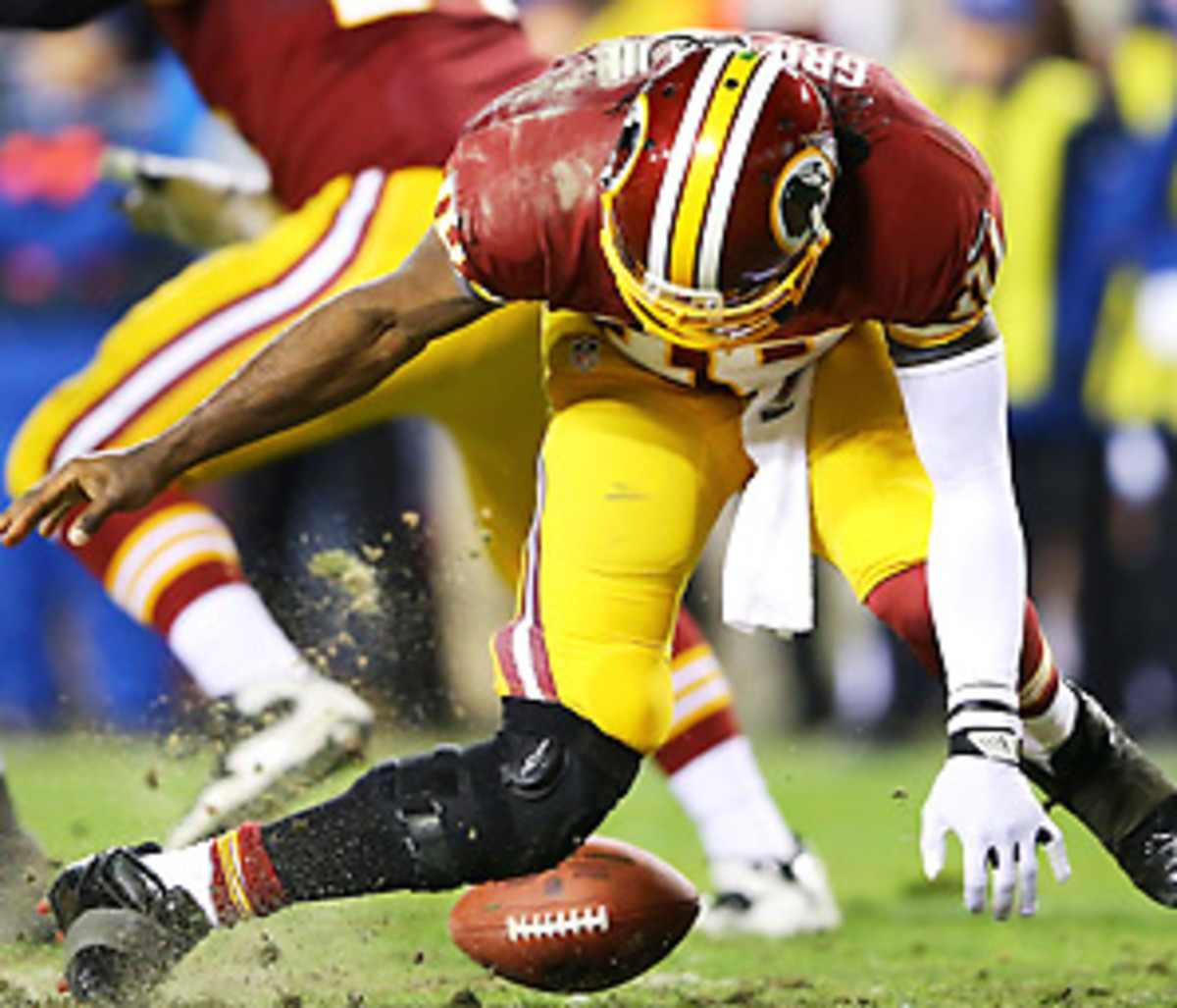 The entire crowd at FedEx Field went silent upon seeing Robert Griffin III's injury. (Al Bello/Getty Images)