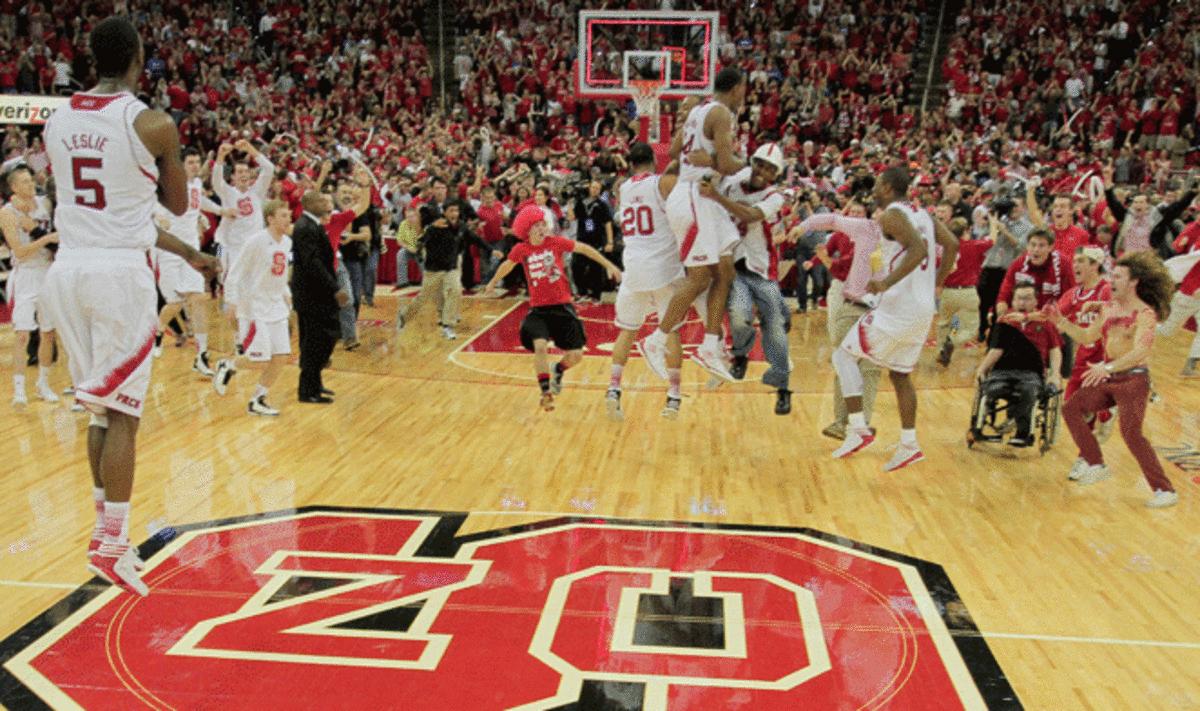 N.C. State student Will Privette (right in the wheelchair) nearly got trampled after the Wolfpack upset Duke earlier this month, but C.J. Leslie (far left) pulled him out of a crowd and to safety.
