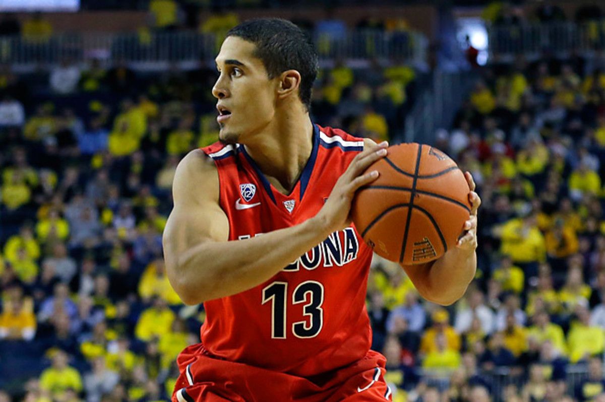 Arizona hit 14 of 15 free throws, including six straight in the final minute by guard Nick Johnson.