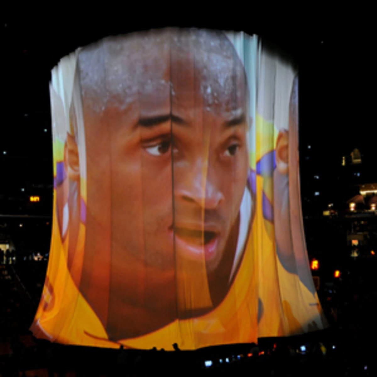 The Lakers presented a montage of Kobe Bryant on the Staples Center video board Sunday. (Noah Graham/NBAE via Getty Images)