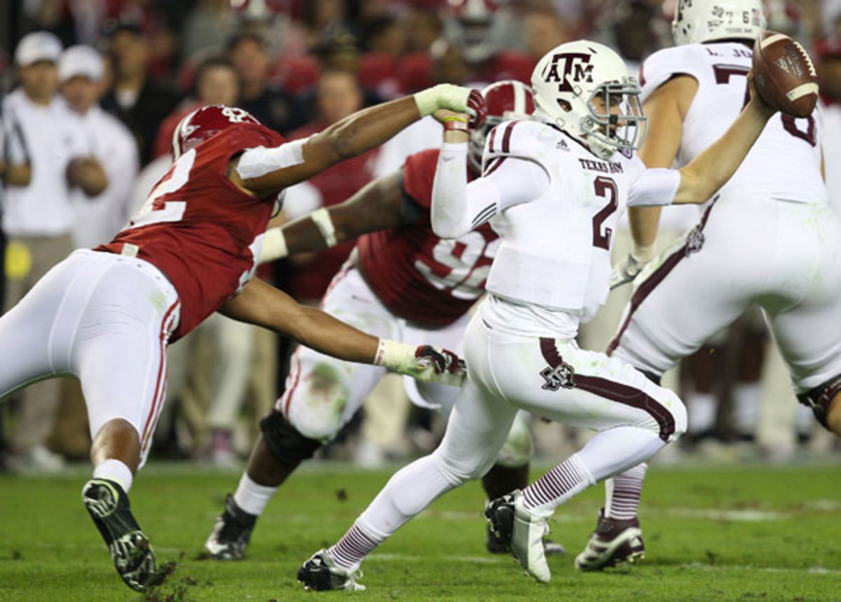 Johnny Manziel was suspended for signing autographs with his likeness on it. (Darren Rovell/ESPN)