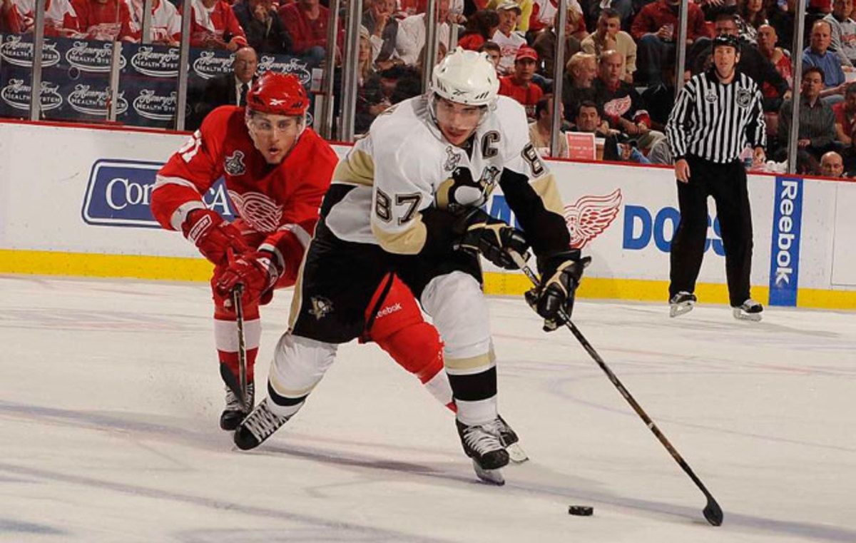 The NHL has worked hard to eliminate head hits like the one Sidney Crosby (right) suffered in the 2011 Winter Classic.