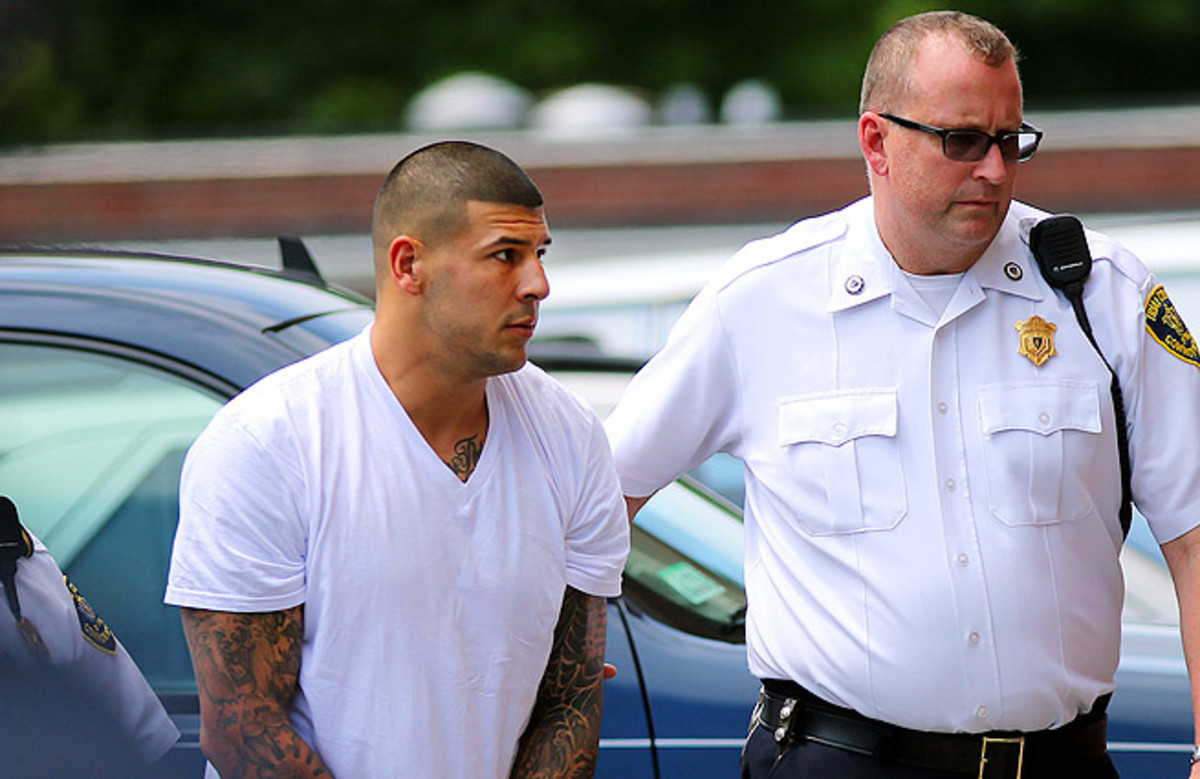 Aaron Hernandez (left) is already facing charges of first-degree murder in the death of Odin Lloyd.