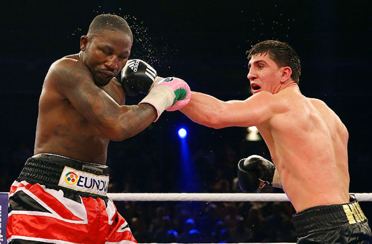 Huck, right, has made 11 successful defenses of the title he won from Victor Emilio Ramirez in 2009.