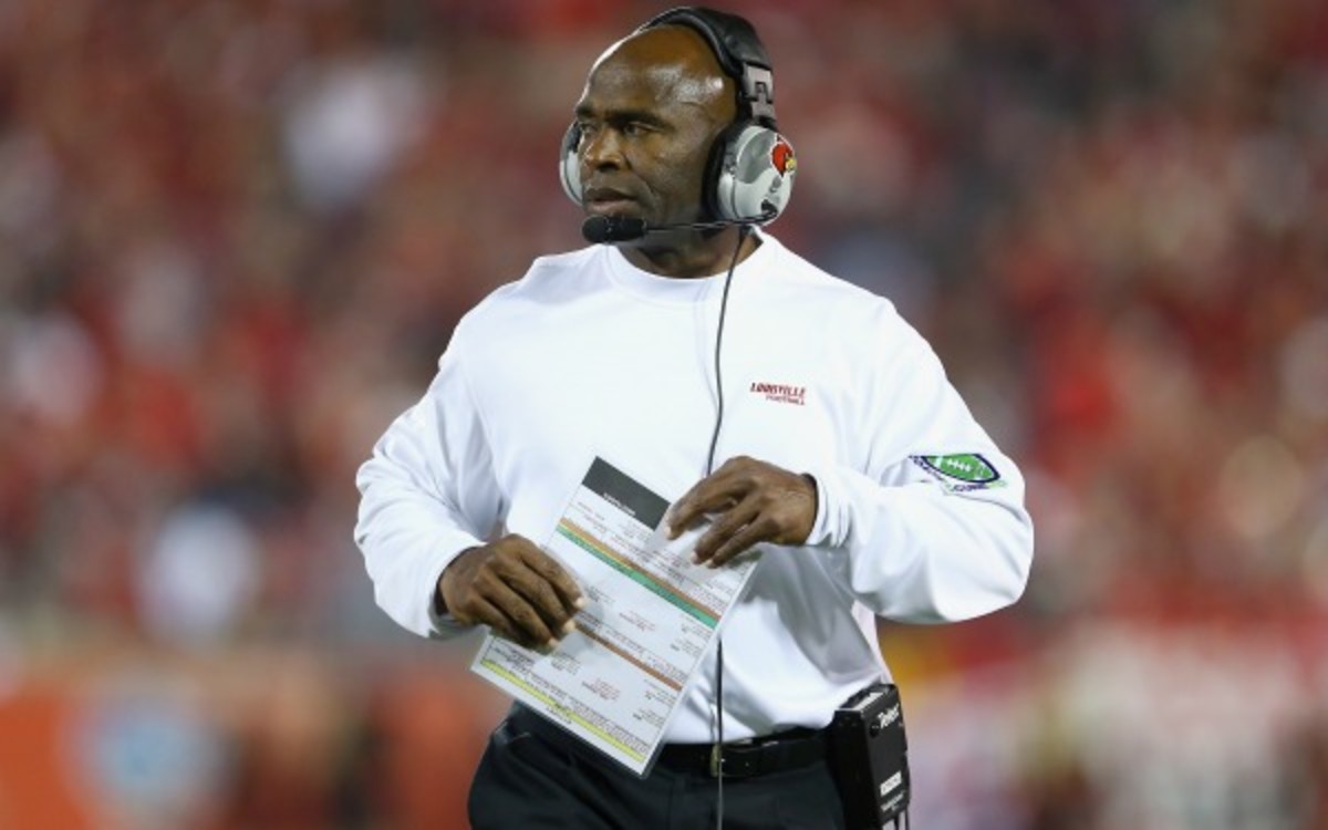 Louisville head coach Charlie Strong is reportedly being considered for the vacant Texas job. (Andy Lyons/Getty Images)