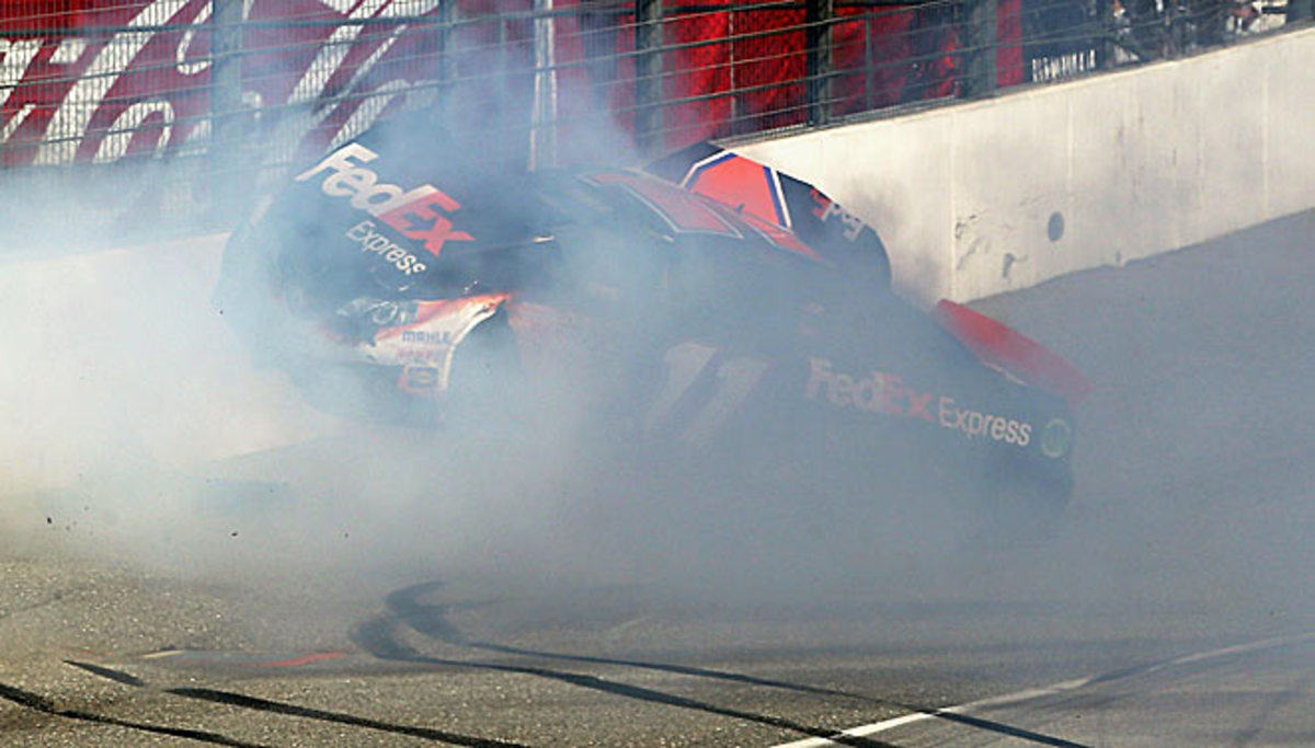 Denny Hamlin hit the wall at Auto Club Speedway head-on after being spun out by Joey Logano.