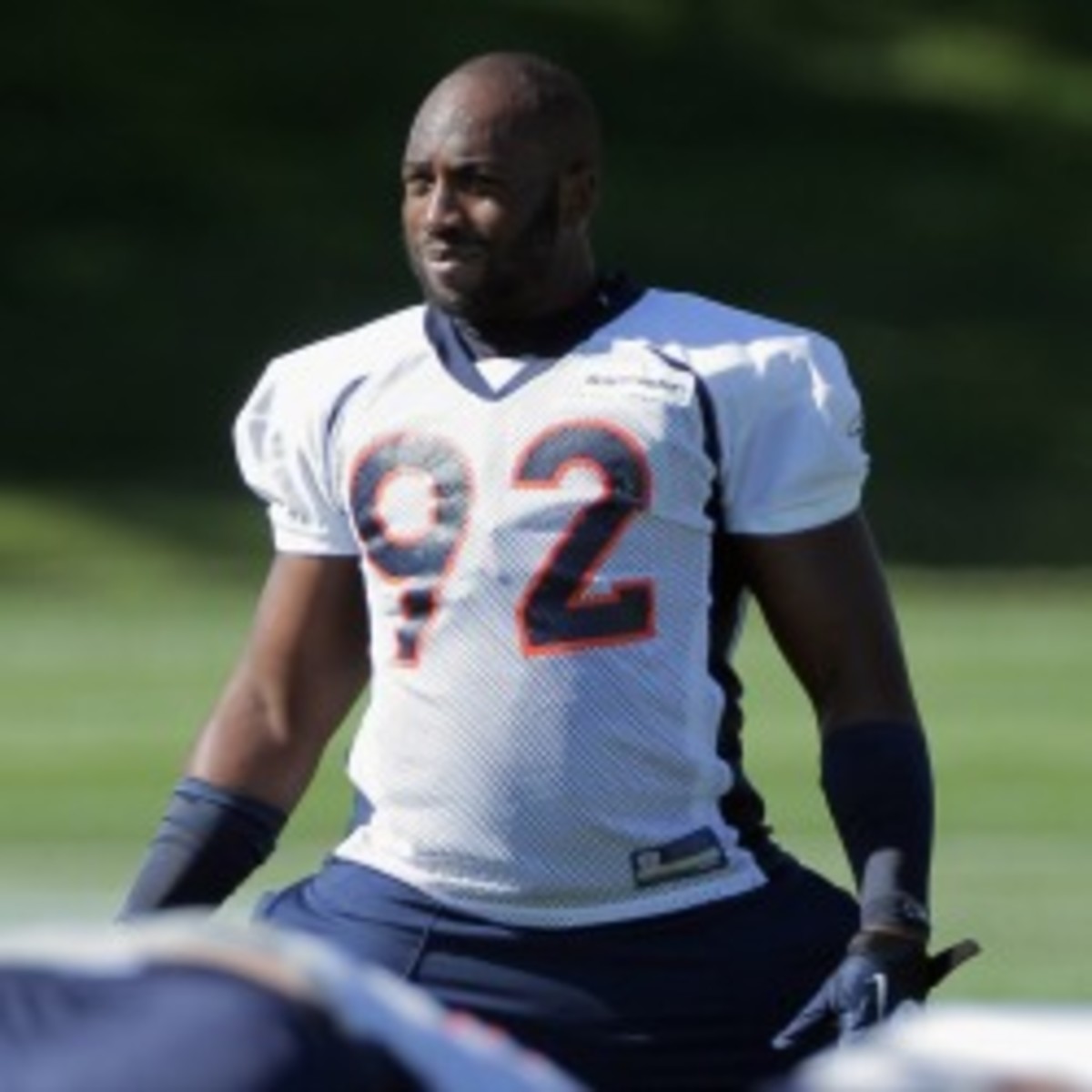 Broncos defensive end Elvis Dumervil has three years and about $30 million left on his contract. (Doug Pensinger/Getty Images)