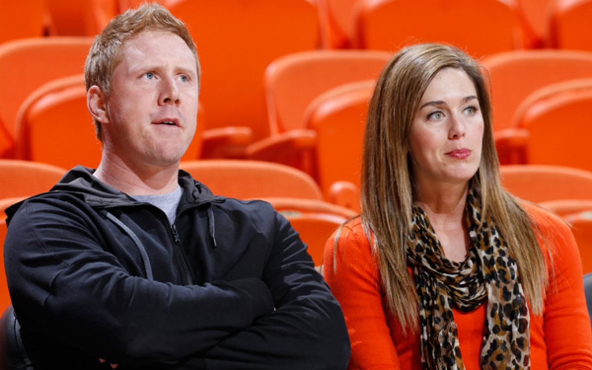 Brandon Weeden and his wife, Melanie, experienced anxious moments for family members Monday as a tornado bore down on Moore, Okla. (Joe Robbins/Getty Images)