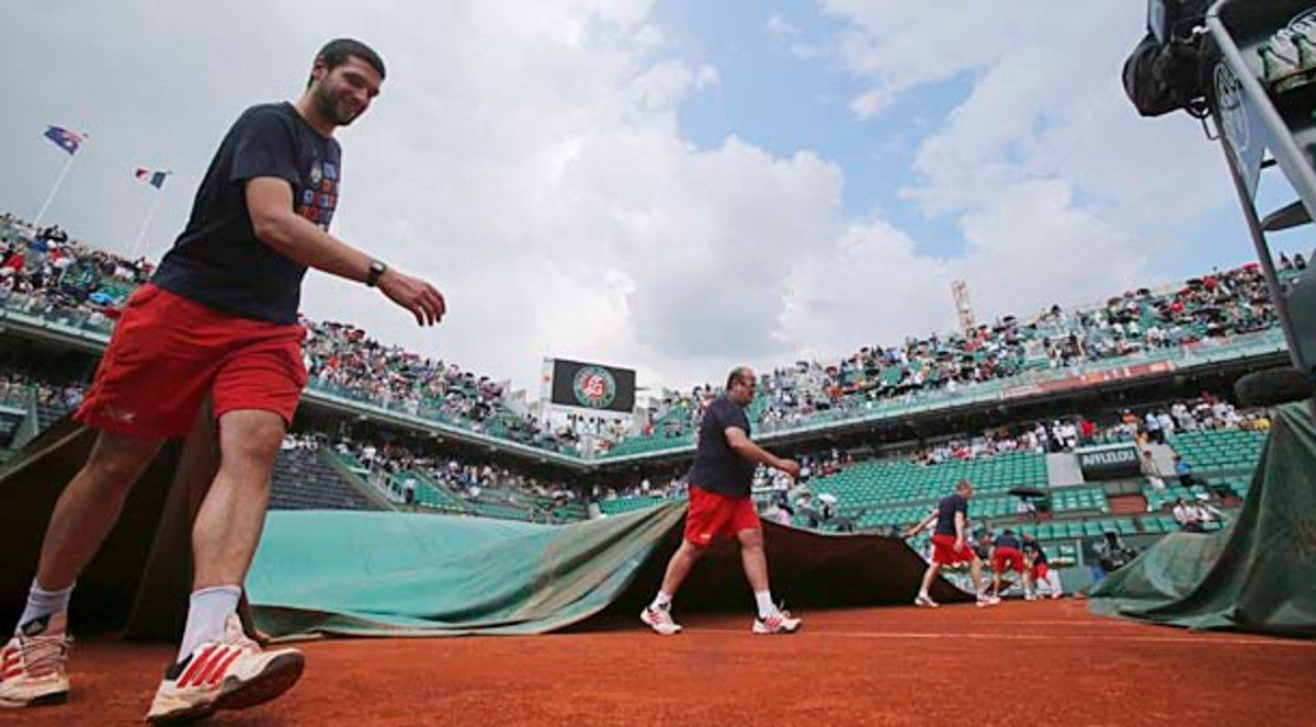 Victoria Azarenka pocketed the second set just as rain began to fall. (Michel Euler/AP)
