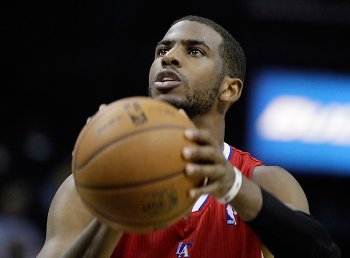 Chris Paul finished the 2012-2013 season averaging almost 17 points and 10 assists per game in his second year on the Clippers. [AP]