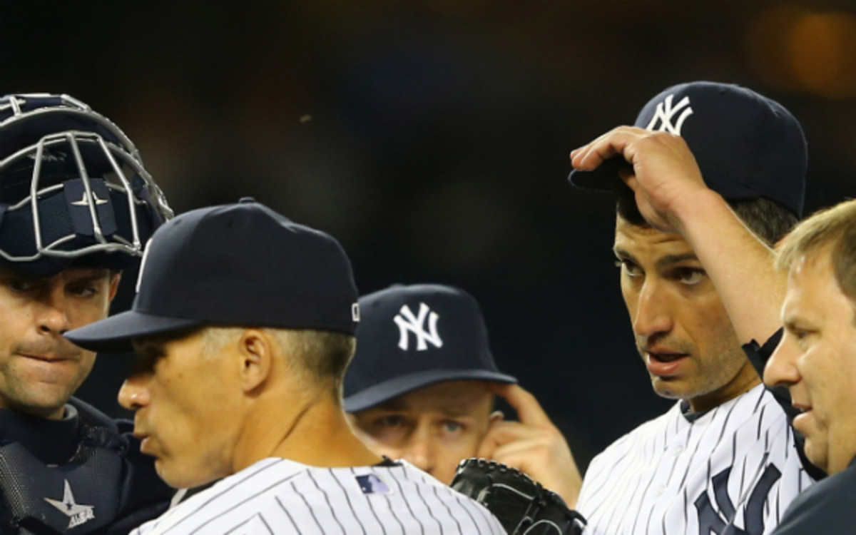 Andy Pettitte left Thursday's start against the Mariners with an apparent injury. (Al Bello/Getty Images)