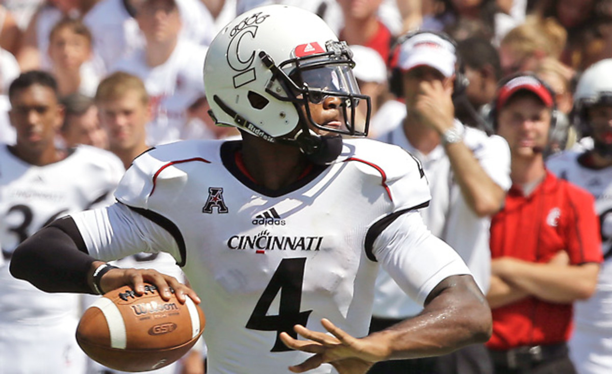 Munchie Legaux threw for 145 yards and scored twice but tossed two picks against Purdue.