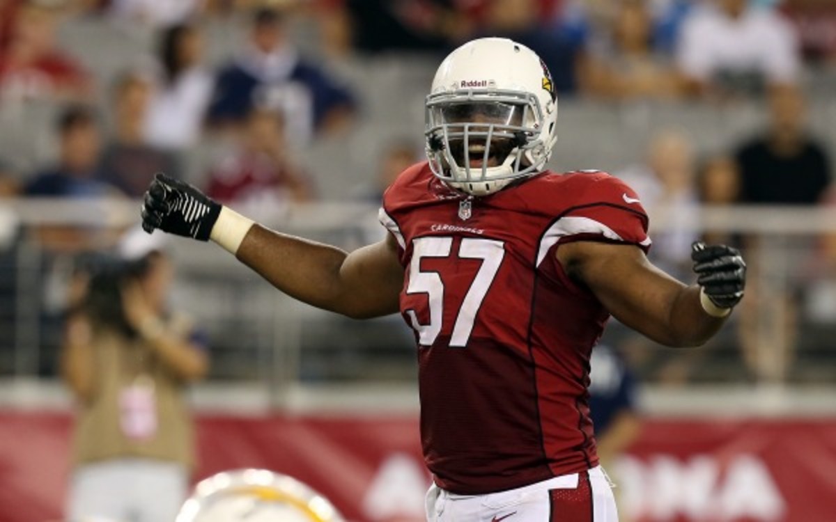 Cardinals linebacker Alex Okafor is done for year after tearing his biceps. (AP Photo/Rick Scuteri)