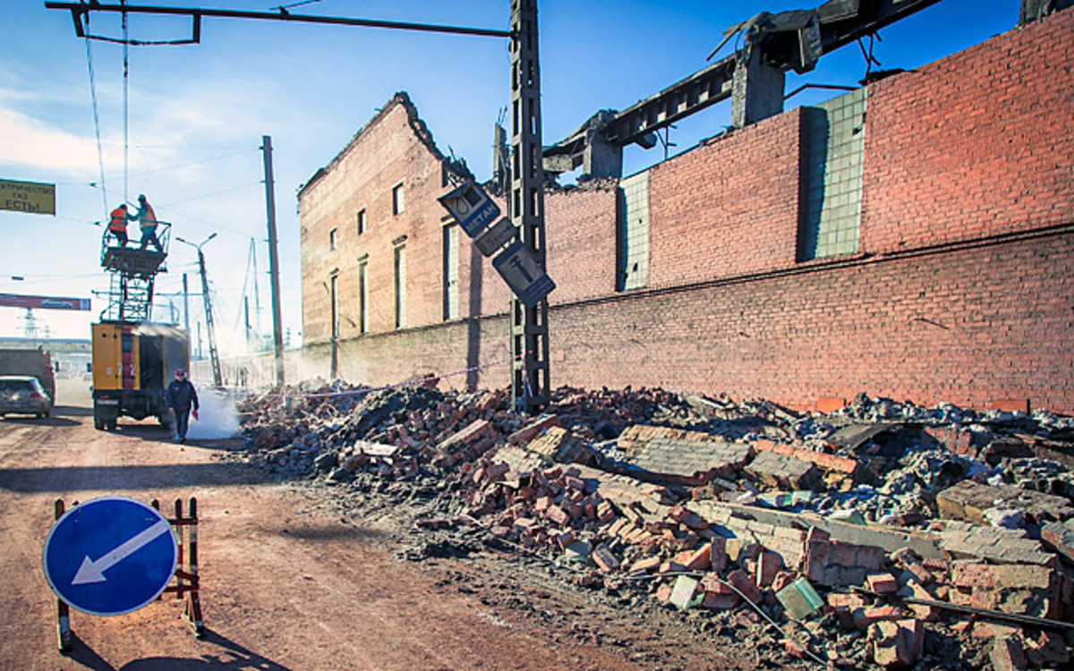 A wall of a local zinc plant is shown after being damaged by a shockwave from a meteor in the Urals city of Chelyabinsk, on Feb. 15. (Oleg Karogopolov/Getty Images).